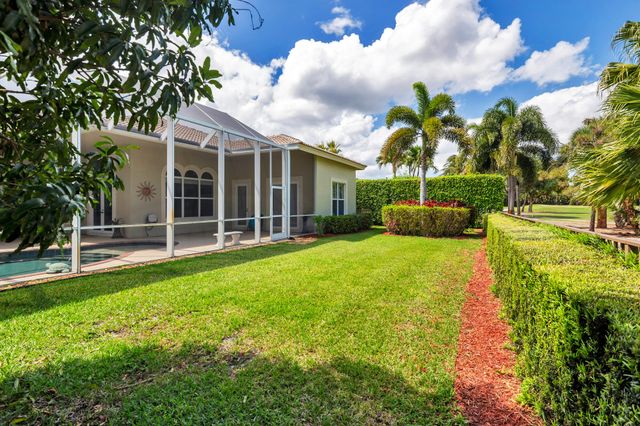 594 N Country Club Drive, Atlantis, FL 33462