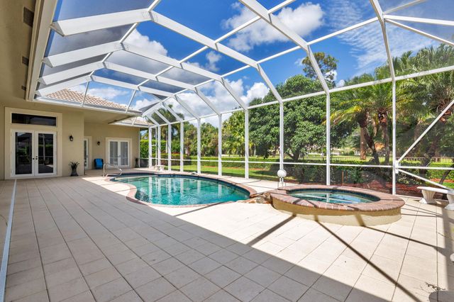 594 N Country Club Drive, Atlantis, FL 33462