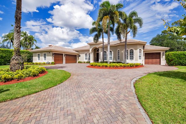 594 N Country Club Drive, Atlantis, FL 33462
