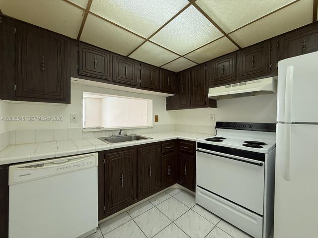 492 NW 165th Street Road 412, Miami, FL 33169