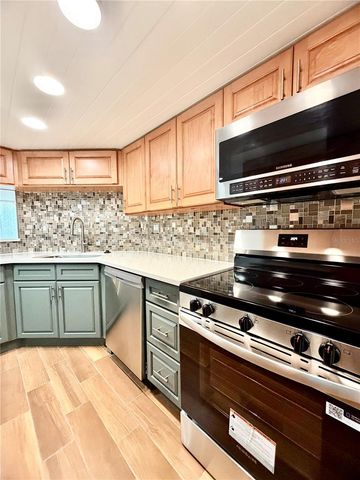7400 SUN ISLAND DRIVE S 111, South Pasadena, FL 33707