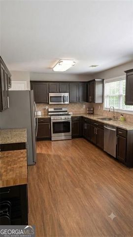 1055 Riverside Walk Crossing, Sugar Hill, GA 30518