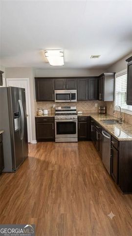 1055 Riverside Walk Crossing, Sugar Hill, GA 30518