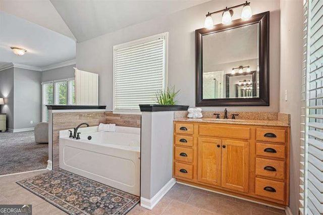 716 Whisper Wind Court, Woodstock, GA 30189