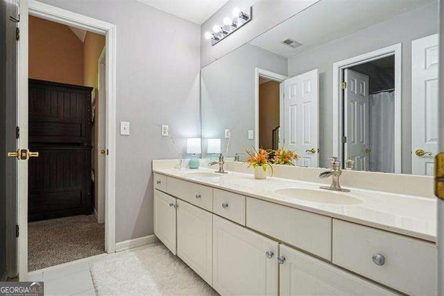 716 Whisper Wind Court, Woodstock, GA 30189