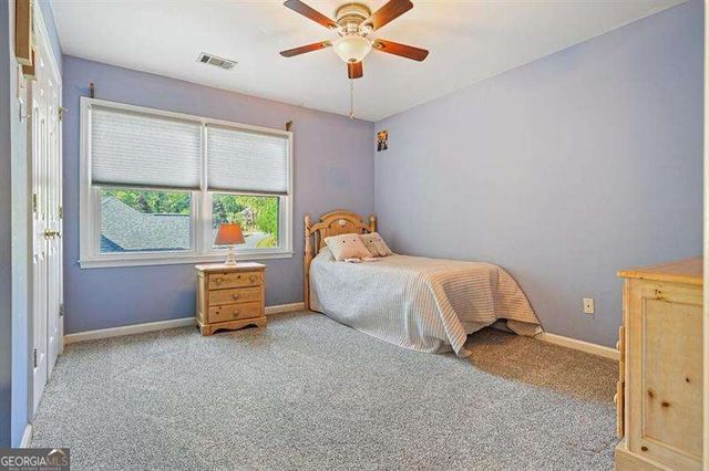 716 Whisper Wind Court, Woodstock, GA 30189
