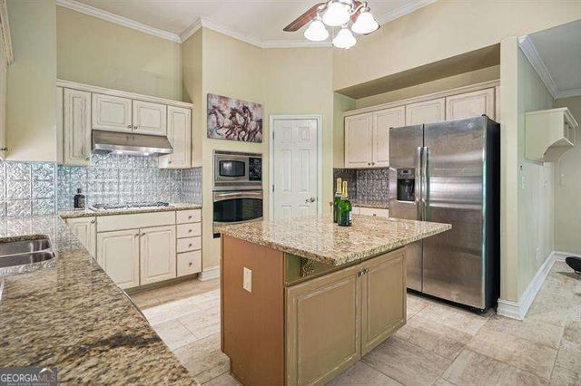 716 Whisper Wind Court, Woodstock, GA 30189