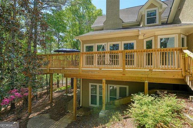 716 Whisper Wind Court, Woodstock, GA 30189