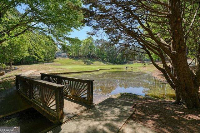 716 Whisper Wind Court, Woodstock, GA 30189