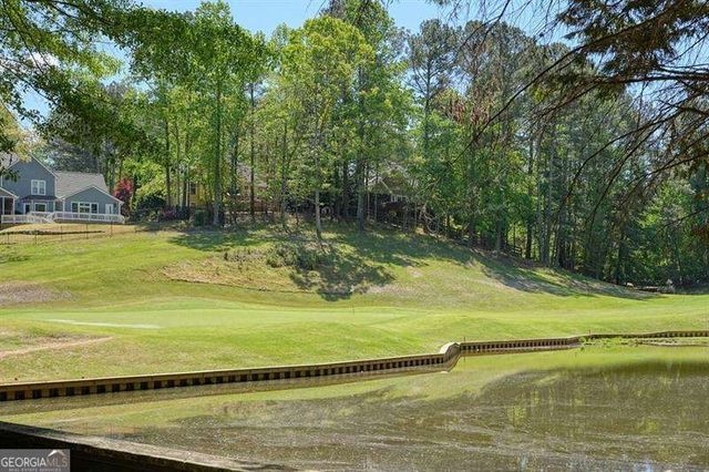 716 Whisper Wind Court, Woodstock, GA 30189