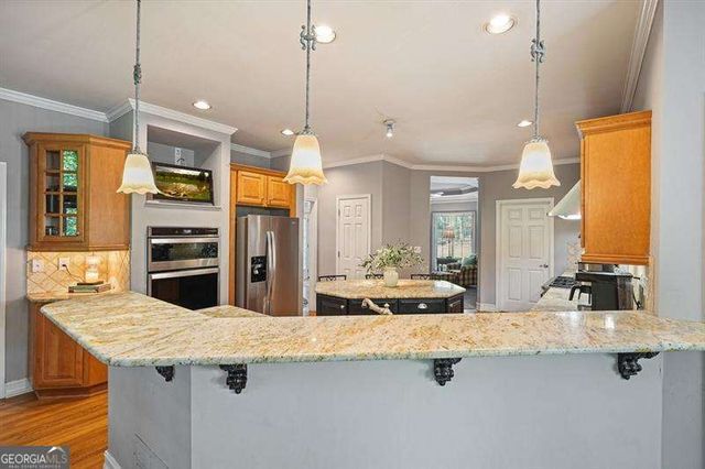 716 Whisper Wind Court, Woodstock, GA 30189
