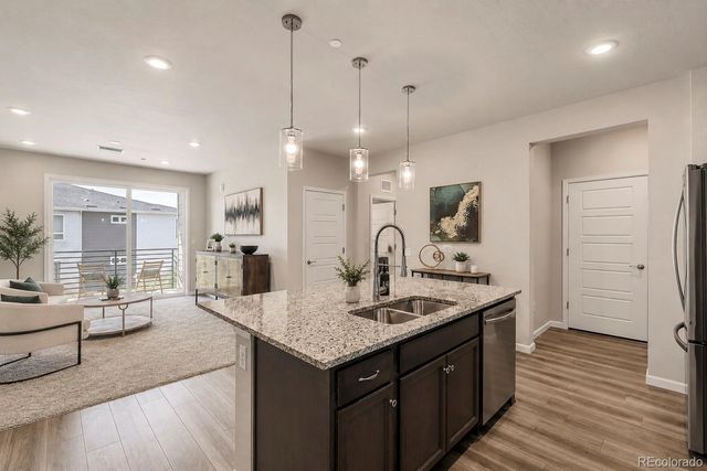 6153 N Ceylon Street 10-303, Denver, CO 80249