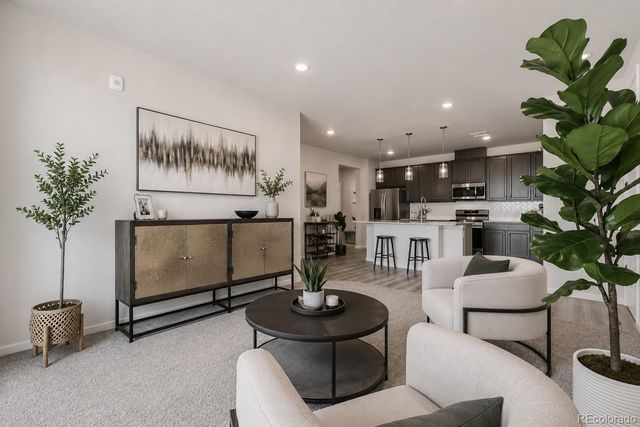 6153 N Ceylon Street 10-303, Denver, CO 80249