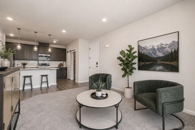 6153 N Ceylon Street 10-303, Denver, CO 80249