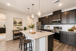 6153 N Ceylon Street 10-303, Denver, CO 80249