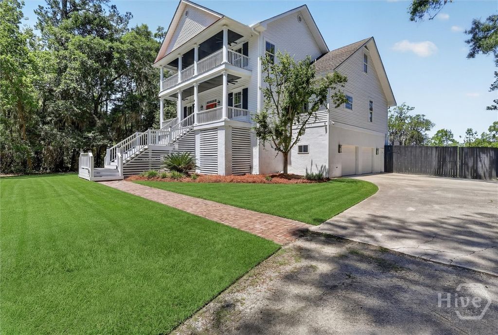 Image 2 of property listing at 447 Sterling Woods Drive, Richmond Hill, GA 31324