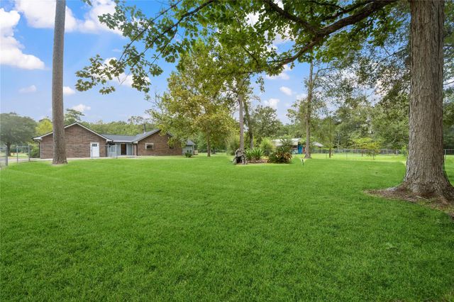 83 County Road 3189c, Cleveland, TX 77327