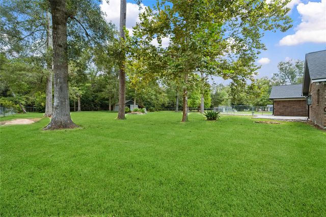 83 County Road 3189c, Cleveland, TX 77327