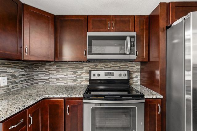 1 Crystal Springs Court CT H, The Hills, TX 78738