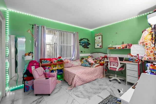 10762 La Placida Drive 7-107, Coral Springs, FL 33065