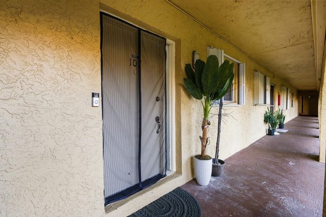 10762 La Placida Drive 7-107, Coral Springs, FL 33065