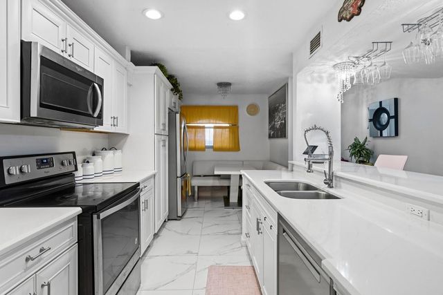 10762 La Placida Drive 7-107, Coral Springs, FL 33065