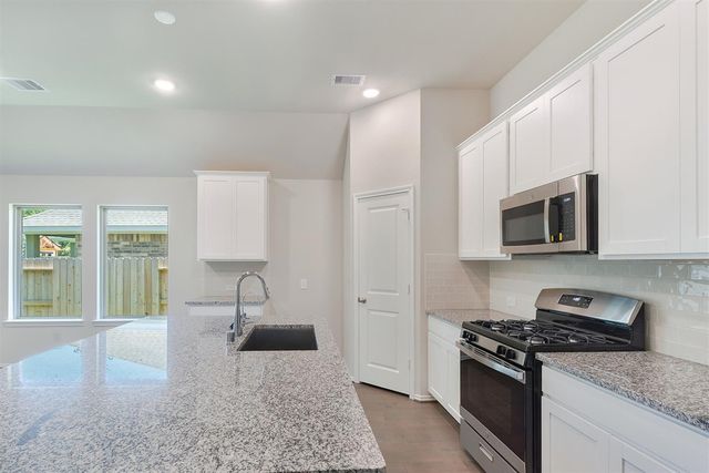 553 Timber Voyage Court, Conroe, TX 77304