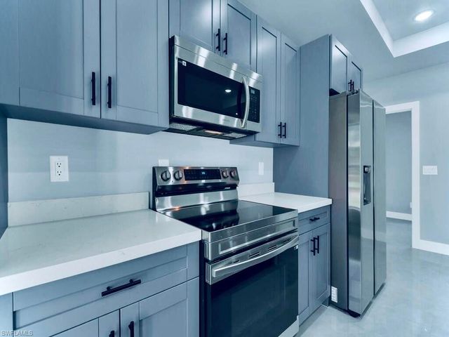 1040 Candlelight DR, Lehigh Acres, FL 33974