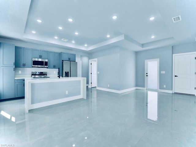 1040 Candlelight DR, Lehigh Acres, FL 33974