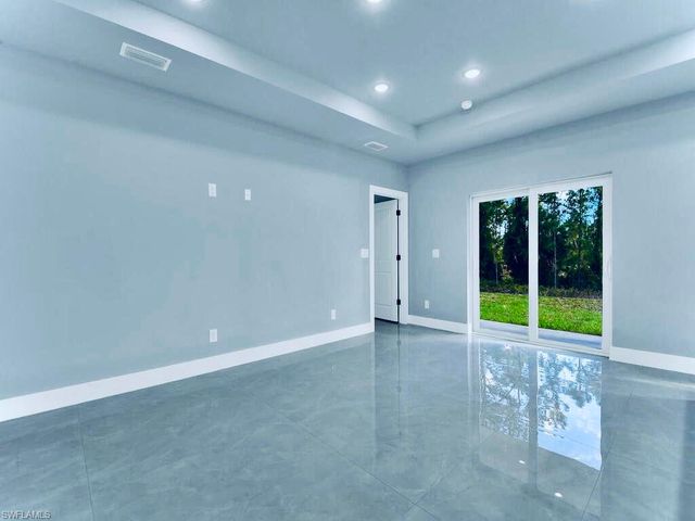 1040 Candlelight DR, Lehigh Acres, FL 33974