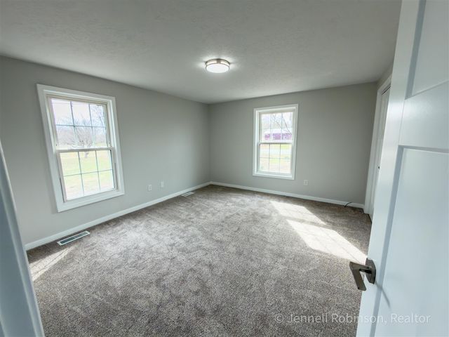7154 Morse Lake Avenue A, Alto, MI 49302