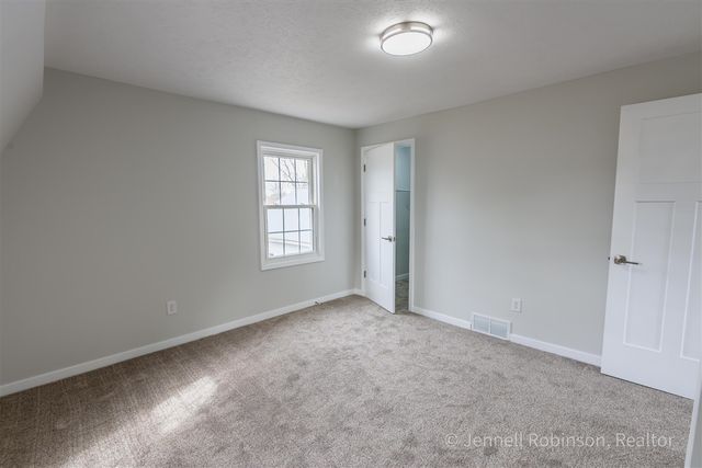 7154 Morse Lake Avenue A, Alto, MI 49302