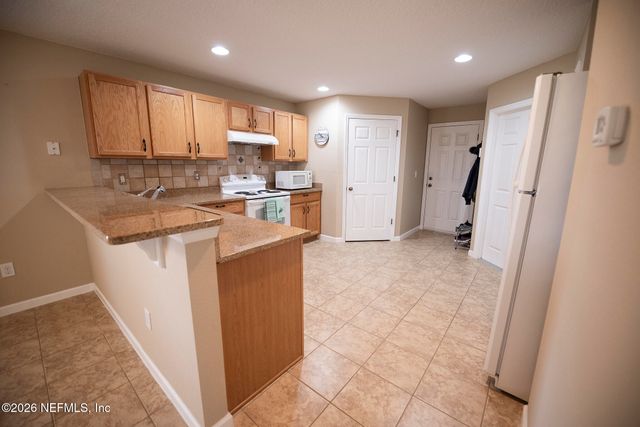 3221 ROUNDABOUT Drive, Middleburg, FL 32068