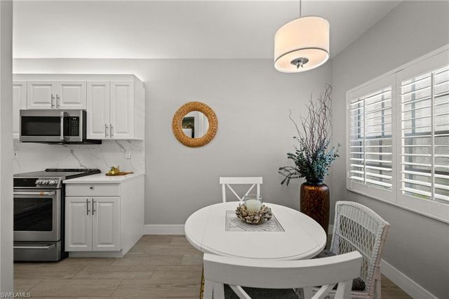 7502 Silver Trumpet LN 103, Naples, FL 34109