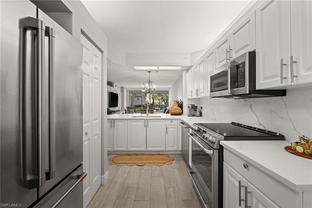 7502 Silver Trumpet LN 103, Naples, FL 34109