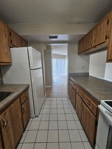 1880 N CONGRESS Avenue 209, West Palm Beach, FL 33401
