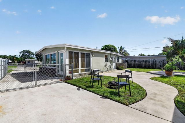 5678 Cinnamon Drive, West Palm Beach, FL 33415
