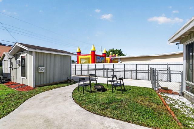 5678 Cinnamon Drive, West Palm Beach, FL 33415