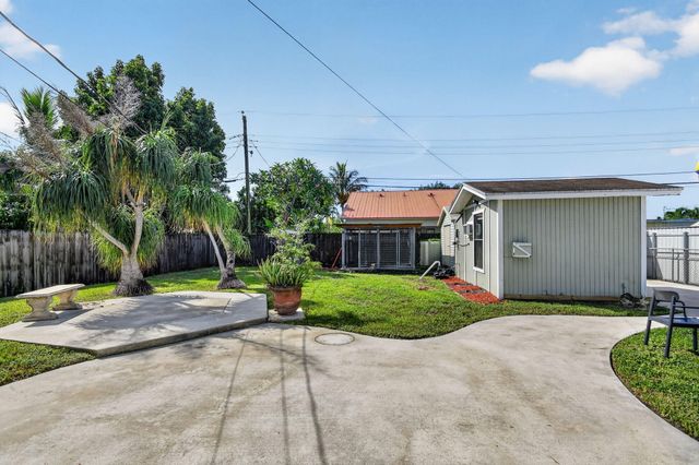 5678 Cinnamon Drive, West Palm Beach, FL 33415