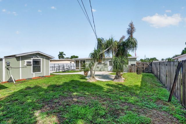 5678 Cinnamon Drive, West Palm Beach, FL 33415