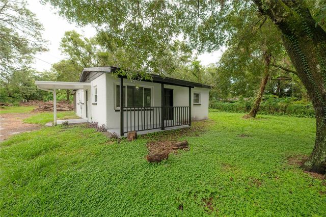 10411 N WOODMERE ROAD, Tampa, FL 33617