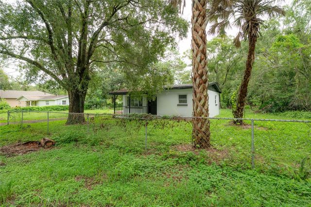 10411 N WOODMERE ROAD, Tampa, FL 33617