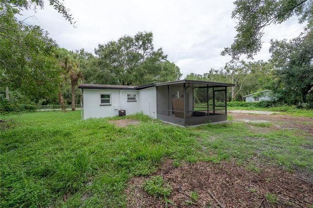 10411 N WOODMERE ROAD, Tampa, FL 33617