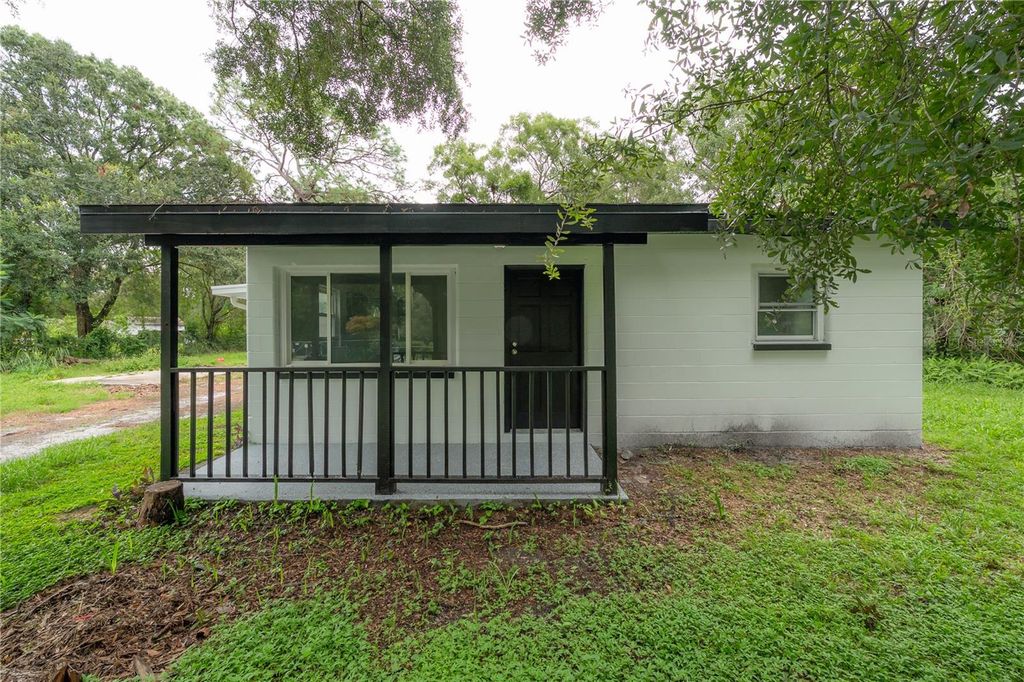 Image 1 of property listing at 10411 N WOODMERE ROAD, Tampa, FL 33617