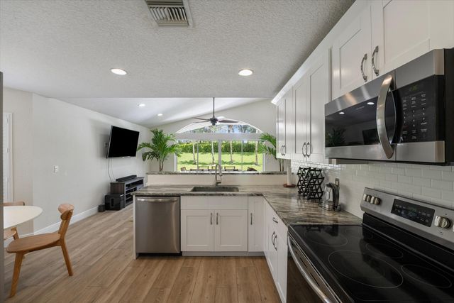 4033 Bluff Harbor Way, Wellington, FL 33449