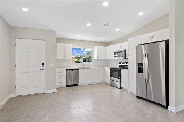 15 Jacaranda Lane, Port St Lucie, FL 34952