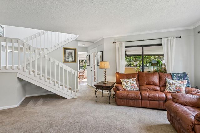24 Uno Lago Drive, Juno Beach, FL 33408
