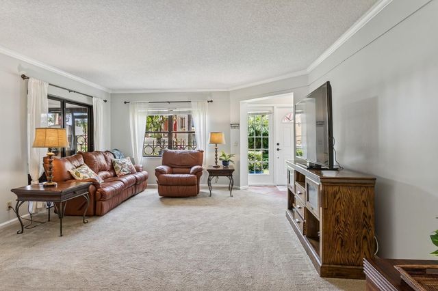 24 Uno Lago Drive, Juno Beach, FL 33408