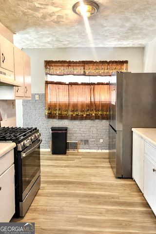 6973 Kimberland Gardens Lane, Lithonia, GA 30058