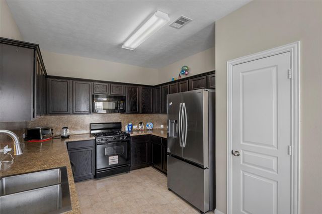 1102 Pecos Pass Drive, Richmond, TX 77406